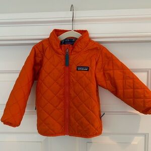 Orange Patagonia down jacket